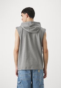 Jordan SPORT SLEEVELESS HOODIE - Top - carbon heather/black