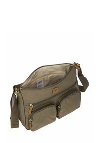 Borsa a tracolla khaki con due tasche anteriori con zip, dettagli in hardware dorato e un ampio interno. Realizzata in tessuto resistente con una finitura testurizzata.
