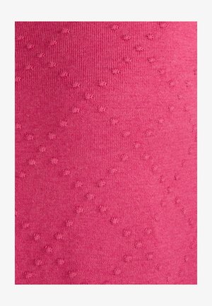 Tejido de punto rosa con una textura suave, que presenta pequeños puntos elevados en un patrón regular en toda la superficie.