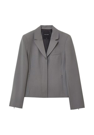 Blazer grigio in tessuto strutturato, con colletto a rever, taschino sul petto, zip laterali e sagomatura aderente.