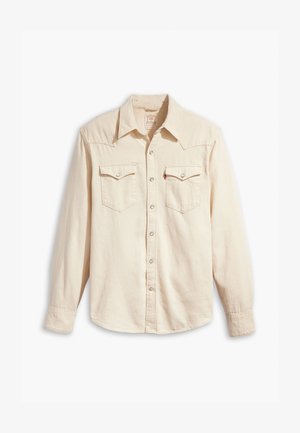 Beige Langarmhemd aus weichem Stoff, mit zwei Brusttaschen, silbernen Druckknöpfen und einem spitzen Kragen mit westernstiligen Yoke-Details.