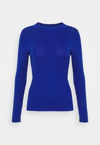 Pitkähihainen slim fit kuninkaansininen ribbieneule, jossa on chevron-kuvio ja pyöreä kaulus valkoista taustaa vasten.