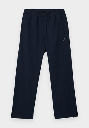 Marineblauwe joggers gemaakt van zachte stof, met een elastische tailleband met trekkoord, zijzakken en ritssluitingen bij de boorden.