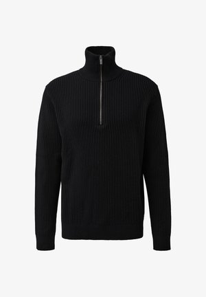 Mustmustri ribaga, kõrge krae ja pool tõmblukk. Omab pikki varrukaid ja tekstuurset kangast, pakkudes liibuvat siluetti.