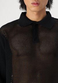 Night Addict Πουλόβερ - black