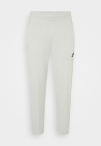 Nike Sportswear Träningsbyxor - silver-coloured