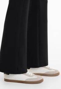 OYSHO NEOPRENE-EFFECT RISE FLARE  - Hlače - black