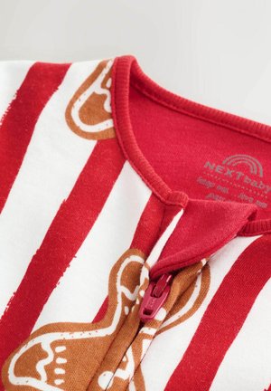 Rot- und weiß gestreifter Babybody mit Reißverschluss und braunem Lebkuchenmann-Design. Aus weichem Baumwollmaterial mit rundem Ausschnitt.