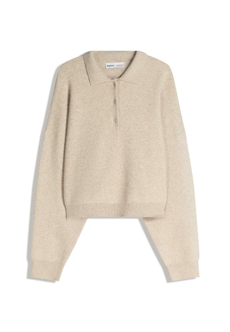 Pullover cropped in misto lana beige con colletto, tre bottoni e maniche lunghe con polsini e orlo a coste. Texture liscia.