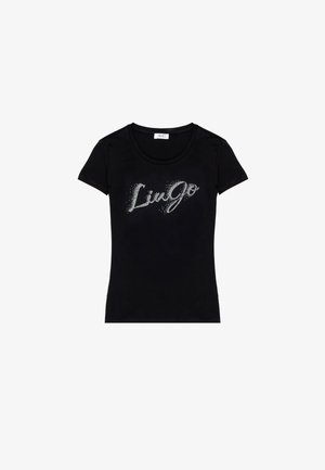 T-shirt noir à manches courtes en coton avec un col rond, présentant le texte argenté pailleté "Liu Jo" placé au centre sur le devant.