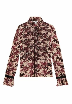 Bluzka z długim rękawem w jasnym kremie, z kwiatowym wzorem w burgundzie i czerni, mająca stójkę i falbaniaste mankiety.