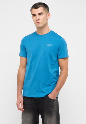 Blue short-sleeve T-shirt made of cotton, featuring a round neckline and a small white logo on the left chest. Soft texture.