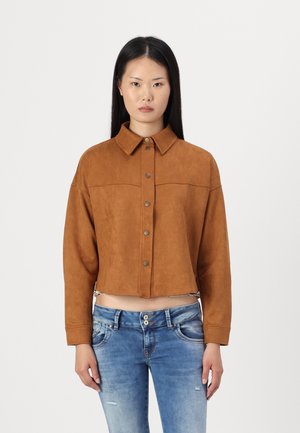 Brown faux suede cropped jacket with a button-up front, collar, and long sleeves. Features a clean, minimalist design and raw hem.