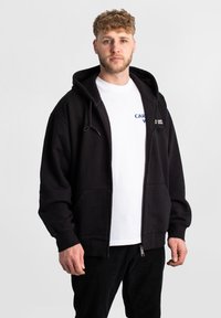 Carhartt WIP Sudadera con cremallera - black wax stone washed