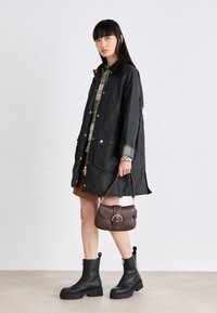 COACH GLOVETANNED SOHO - Handbag - maple