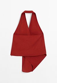 Red wrap top with a halter neckline and asymmetric hem. Made from lightweight fabric, featuring a smooth texture and minimal seams.