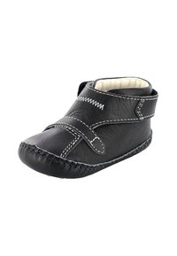 Stivale in pelle nera con cuciture bianche, punta arrotondata, design flessibile e cinturino in velcro. Interno morbido per il massimo comfort.