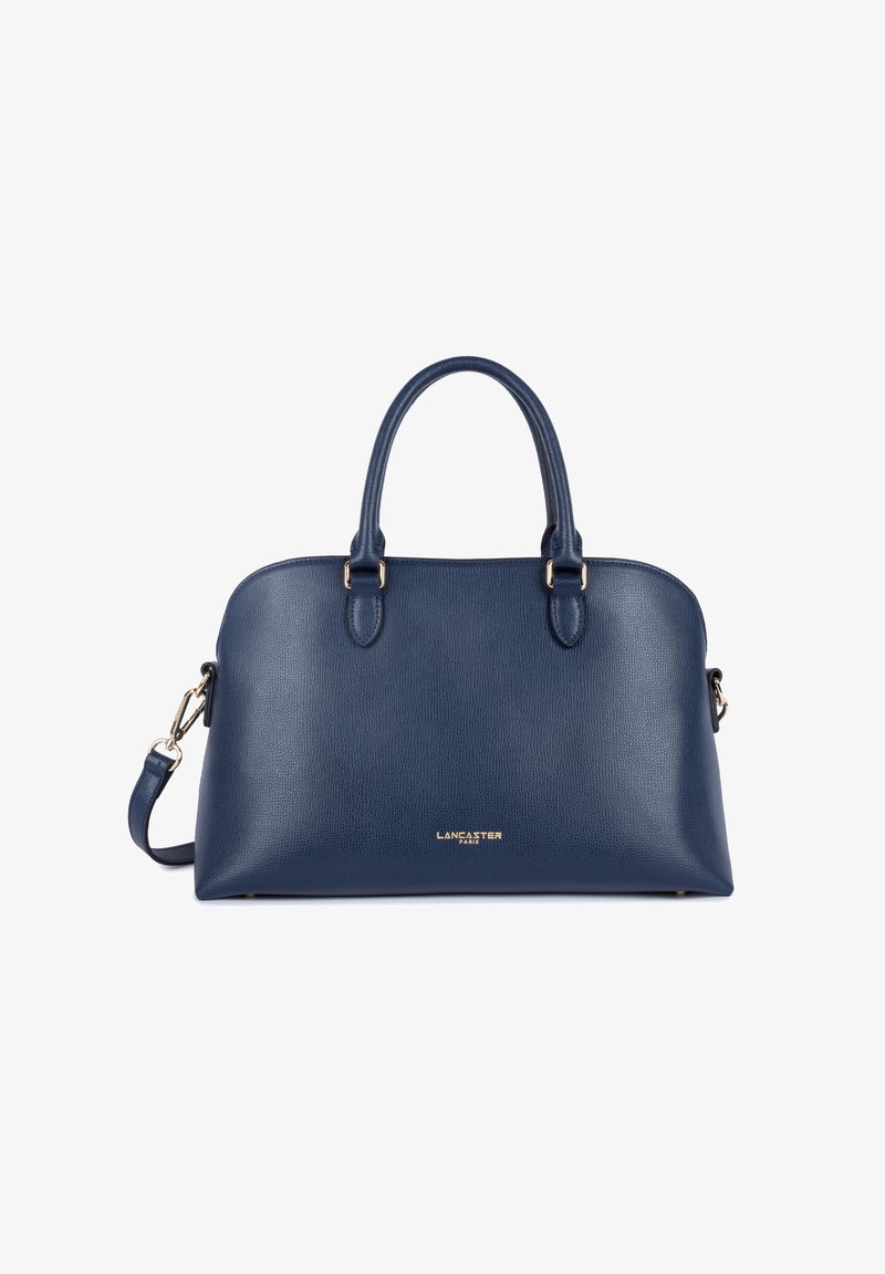 Sac à main en cuir bleu marine avec une forme structurée, deux poignées supérieures, une sangle d'épaule amovible et des détails en métal doré.
