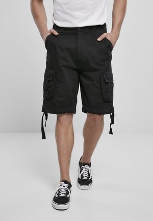 Zwarte cargoshorts van katoen, met zijzakken, verstelbare beenbanden en een losse pasvorm. Draag ze met zwarte sneakers.