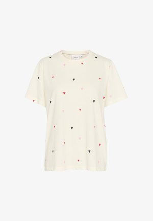 Kremna kratka majica s kratkimi rokavi iz bombaža, ki ima raztresen vzorec majhnih srčkov v rdeči, rožnati in črni barvi. Okrogli izrez, sproščen kroj.
