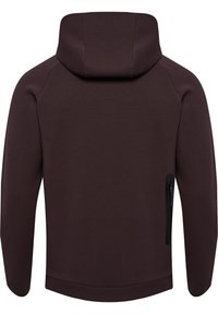 Ciemnobrązowa kurtka z kapturem, długimi rękawami i pionową czarną kieszenią zapinaną na suwak po prawej stronie na dolnej części pleców.