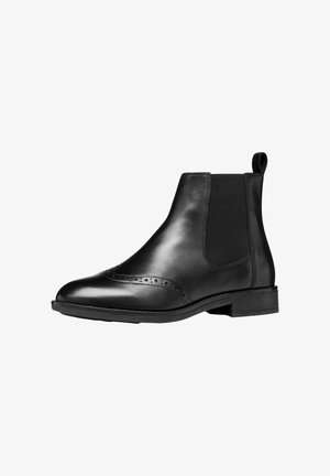 Zwarte leren enkellaarzen met elastische zijkanten, ronde neus, subtiele brogue-details op de neuskap en een lage blokhak.