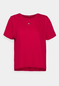 Short-sleeve, round-neck t-shirt in bright pink cotton. Features a small, multicolored logo on the chest and a relaxed fit with a straight hem.