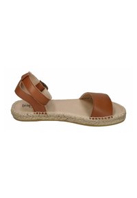Brown leather sandal with a flat jute sole, open toe design, and ankle strap. Features a simple buckle and smooth texture.