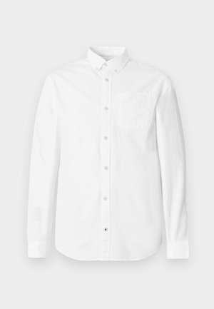 Weißes Langarmhemd aus Baumwolle. Verfügt über einen Button-Down-Kragen, eine Brusttasche und eine dezente Textur. Gerade Saumlinie mit Knopfverschlüssen.