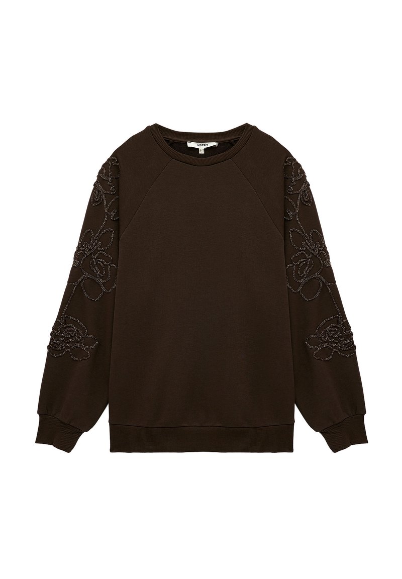 Sudadera marrón con patrón floral bordado en las mangas, escote redondo y puños acanalados. Confeccionada en tela suave con un corte relajado.