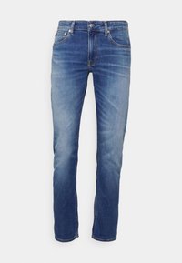 Denim jeans in medium blue with a faded finish. Straight-leg cut with five pockets, a zipper fly, and a belt loop waistband.