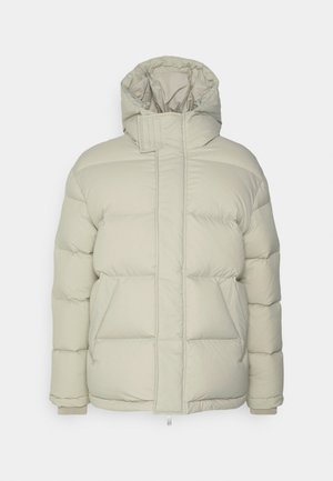Light beige puffer jacket with a high collar and hood, featuring quilted sections, front pockets, and elastic cuffs. Smooth fabric texture.