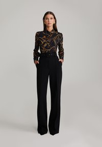 ANDIATA LUCIA - Pantaloni - black