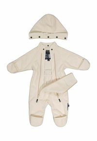 Cremefarvet baby-sneaksuit med hætte, trykknaplukning, to for-lynlåse og ribkant ved anklerne. Stoffet fremstår blødt og tekstureret.