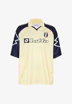 Yellow and navy Lotto soccer jersey with Italia shield crest on chest and zigzag white pattern on navy sleeves.