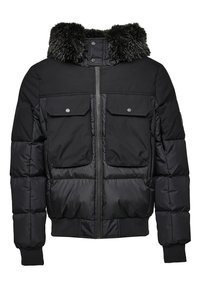 Svart boblejakke med glidelås foran, to store brystlommer, ribbede mansjetter og nederkant, samt en avtakbar faux fur-krage.