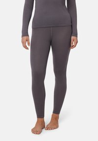 Leggings grigi fatti di un tessuto morbido e leggero con un design aderente, caratterizzati da una finitura liscia e senza motivi o loghi visibili.