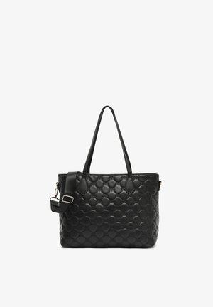 Czarna torebka tote z pikowanej ekologicznej skóry, z dwiema górnymi uchwytami i regulowanym paskiem na ramię. Posiada sześciokątne przeszycia oraz złote akcenty.