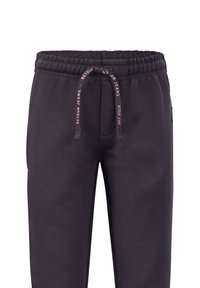 Dunkelgraue Joggerhosen aus weichem Stoff mit elastischem Bund, Kordelzug und seitlichen Taschen; minimalistisches Design mit Nahtdetails.