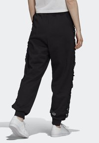 adidas Originals Träningsbyxor - black