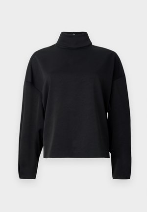 Mustapaita, jossa on pitkä hiha, korkea mock neck, rento istuvuus, pehmeä tekstuuri ja roikkuvat olkasaumat. Ei näkyviä kuvioita tai koristeita.