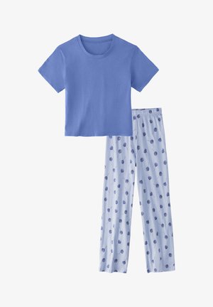 T-shirt di cotone blu con maniche corte abbinata a pantaloni da pigiama blu chiaro con motivo di cerchi blu scuro su steli sottili.
