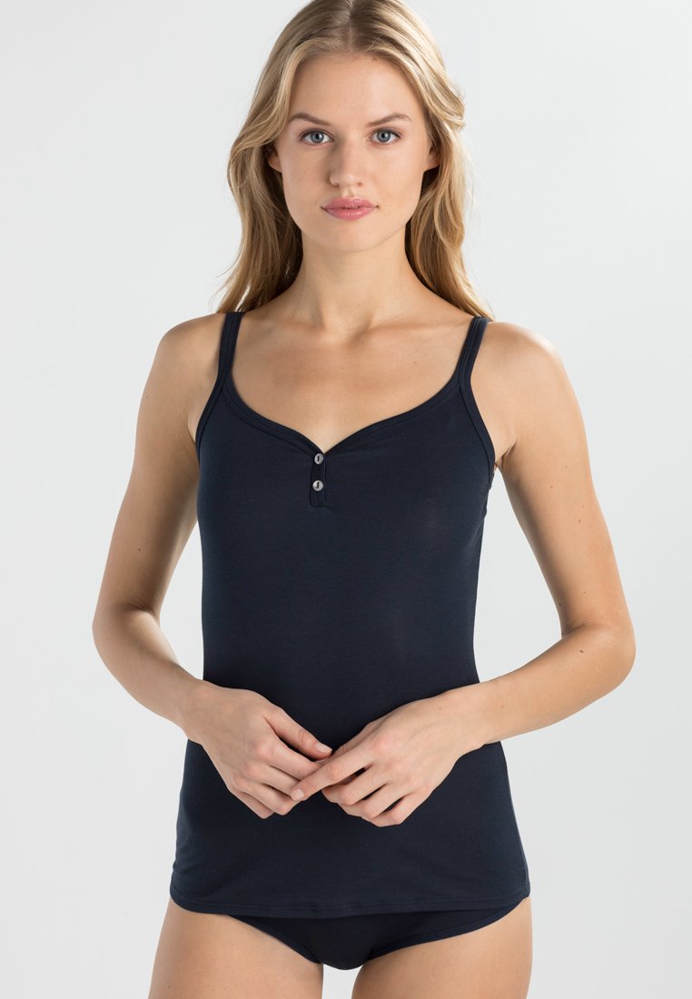 Navy blue tank top with a V-neckline and thin straps, featuring two decorative buttons at the front and a smooth, stretchy fabric.