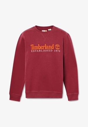 Bordeaux sweatshirt aus Baumwolle, mit der bestickten Aufschrift "Timberland ESTABLISHED 1973" in orange. Mit gerippten Bündchen und Rundhalsausschnitt.