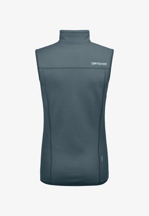 Sleeveless turtleneck vest in dark teal, made from soft fabric with a smooth texture. Features flat seams and subtle branding detail.
