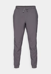 Grå lätta byxor med elastisk midja och dragsko, smalnande ben och sidofickor. Tillverkade av slät, ventilerande tyg.