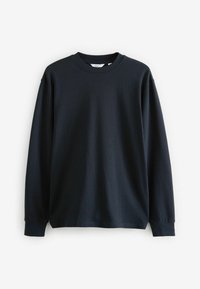 Marineblauw T-shirt met lange mouwen, gemaakt van zachte katoen, met een ronde hals en een relaxte pasvorm, voorzien van omgeslagen mouwen en zonder zichtbare patronen.