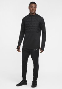 Nike Performance - Spodnie treningowe