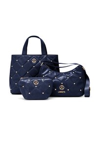 Set di borse in similpelle trapuntata blu navy con borchie color oro, comprende una borsa tote grande, una borsa a tracolla e una pochette piccola.