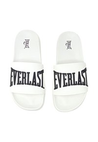 Infradito bianchi con il logo "EVERLAST." in nero sulla cinghia, caratterizzati da una texture liscia e un design minimale. Suola piatta, stile open-toe.